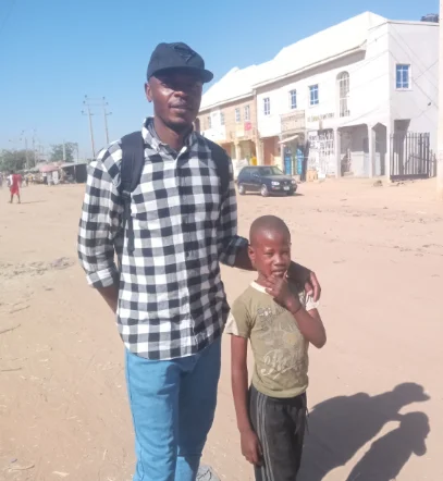 AprilMission Chairman with a child he rendered help to